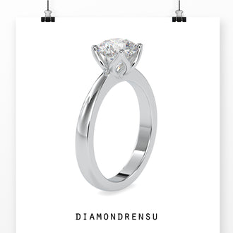 Diamond solitaire ring round cut in a timeless design.