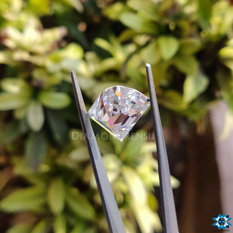 Antique cut moissanite in elephant tooth shape crafted as a loose moissanite stone for jewelry.
