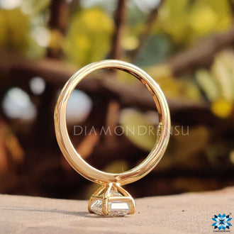 Elegant moissanite emerald cut engagement ring for proposals.
