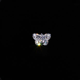 0.92 CT Butterfly Cut Loose Moissanite from Diamondresnu.
