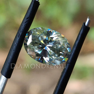 Oval cut Light Green moissanite listed for custom jewelry.
