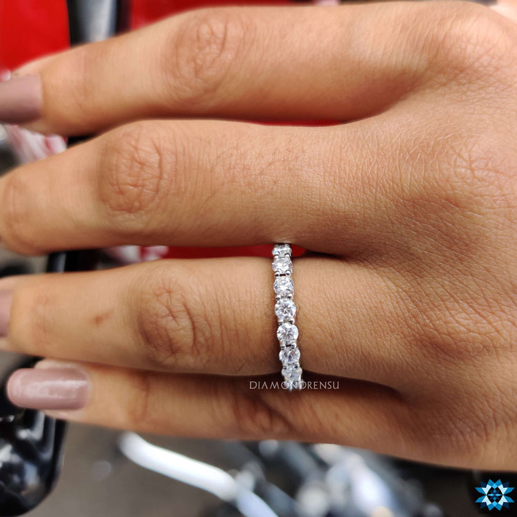 Trellis eternity band with intricate design for timeless appeal.