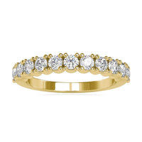 Half eternity band ring with round cut shared prong diamonds.
