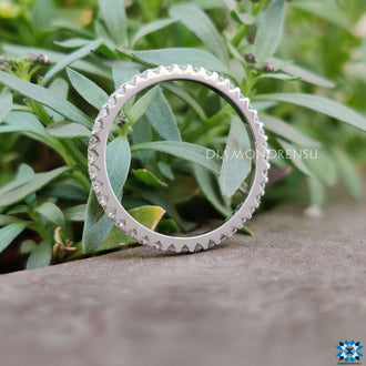 A refined band moissanite with a perfect fit, showcasing stunning brilliance.