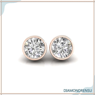 Stunning round gold earrings studs, featuring bezel set earrings for a secure fit.
