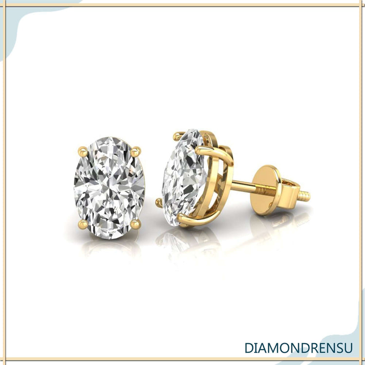 Dazzling oval stud diamond earrings, featuring a tapered basket post for secure fit.