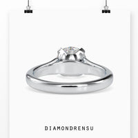 Round brilliant diamond ring with a secure prong setting.
