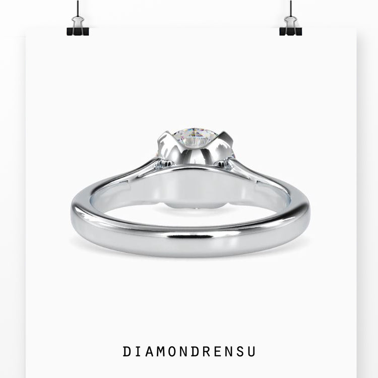 Round brilliant diamond ring with a secure prong setting.
