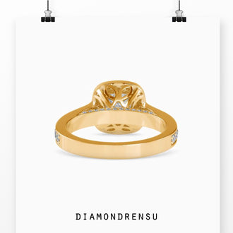 Timeless round brilliant cut diamond ring with a delicate prong setting.
