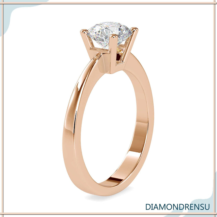 Handmade diamondrensu engagement ring featuring a basket setting and IGI certified diamond.