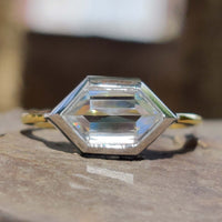 East West Engagement Ring showcasing elegant design with modern style.
