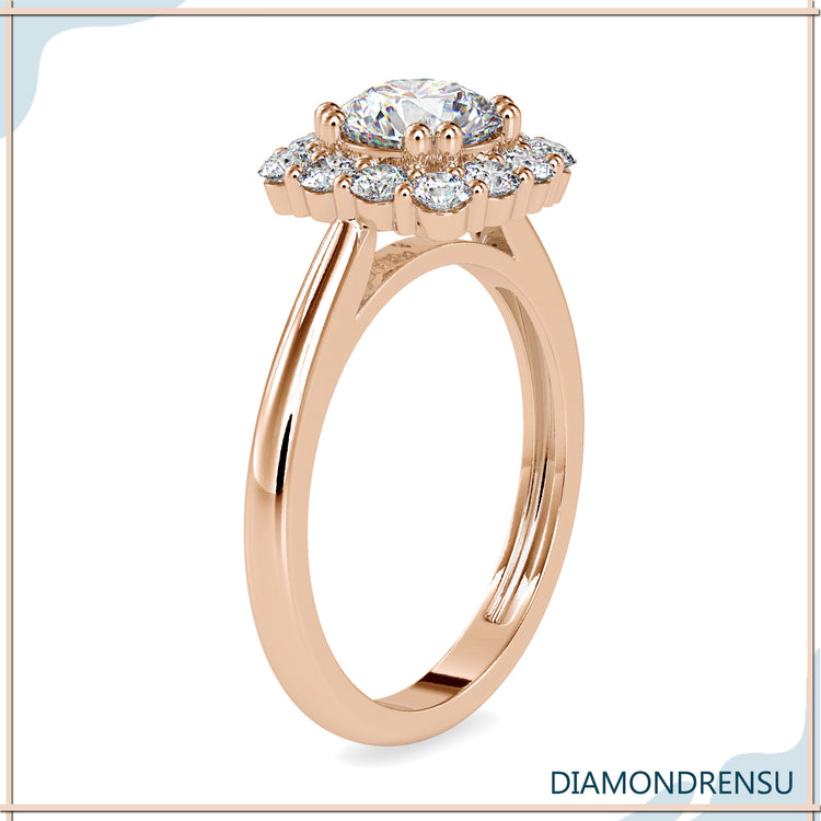 Round cut diamond engagement ring with an elegant halo.
