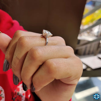 A V prong setting marquise style princess cut engagement ring that exudes sophistication.