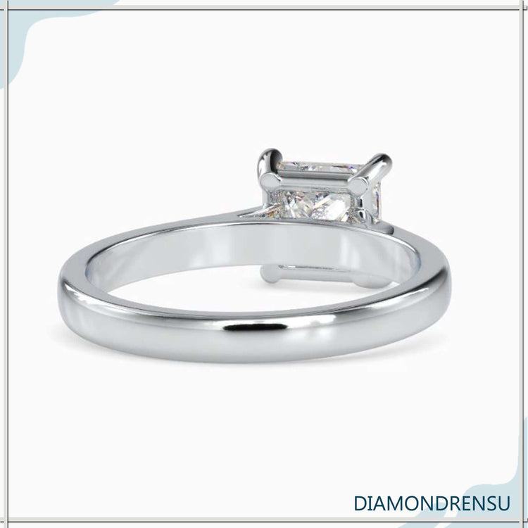 Princess cut solitaire ring with a diamond solitaire setting, crafted by DiamondRensu.
