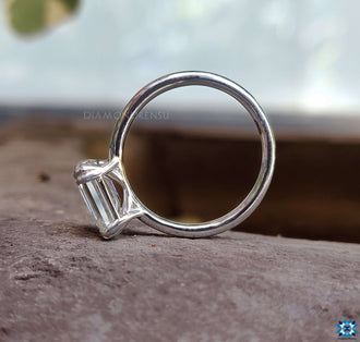 Engagement moissanite ring with a solitaire emerald cut for a classic look.
