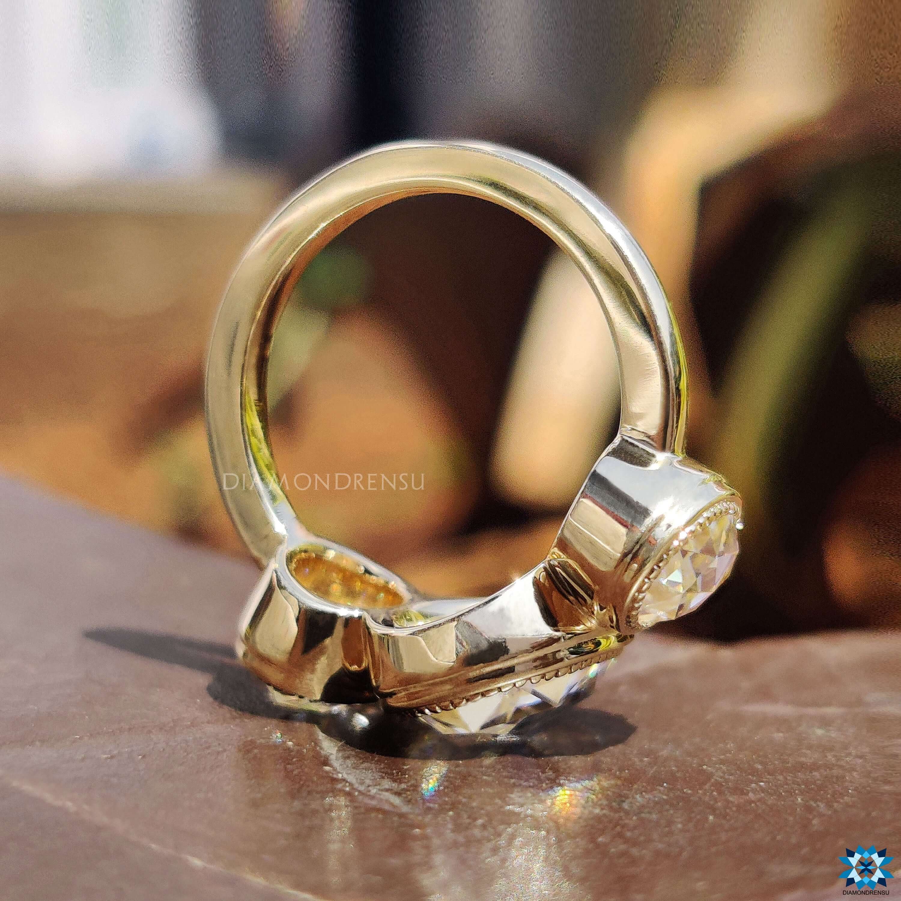 moissanite three stone engagement ring