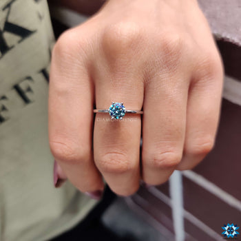 A moissanite ring with intricate craftsmanship, radiating timeless beauty.

