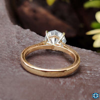 4 prong solitaire engagement ring offering security and stunning brilliance.
