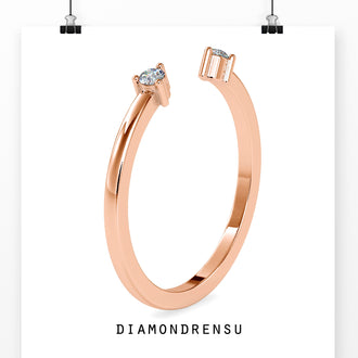 3 prong ring settings on an open band ring with a modern cuff style.
