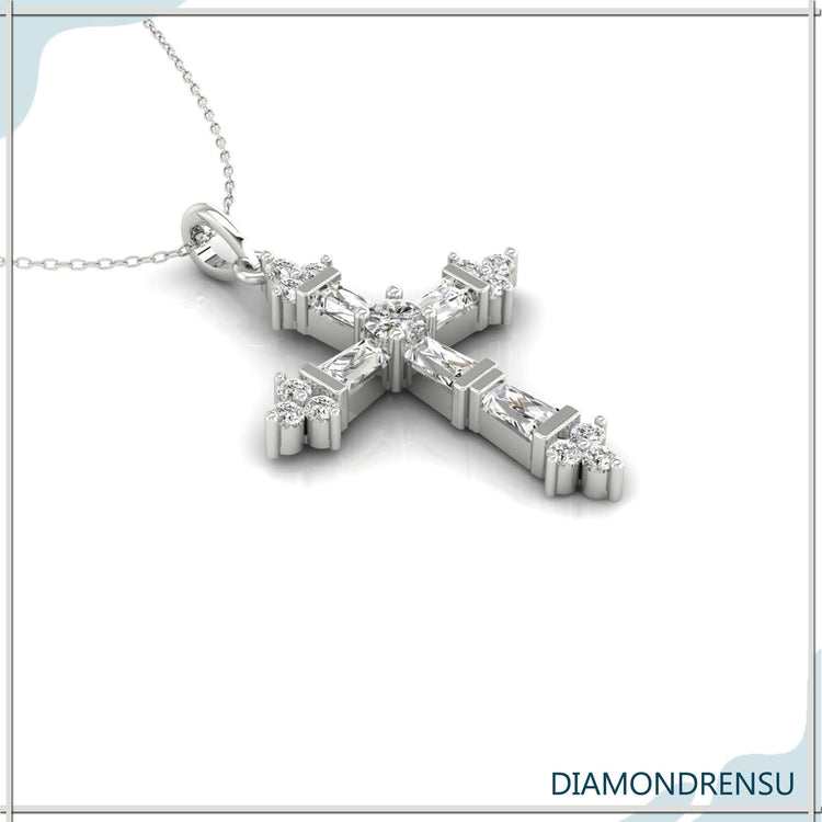 Classic round diamond cross pendant with a tapered baguette design.
