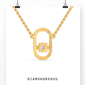 The small pendant adds a delicate, minimal touch.
