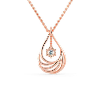 The sunburst halo pendant enhances the central stone’s sparkle.
