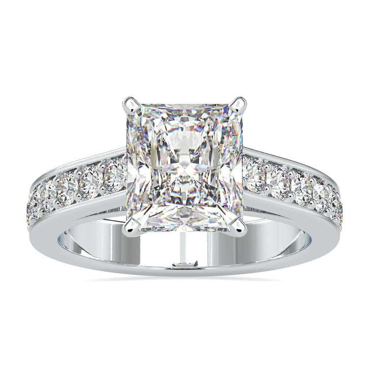 A radiant cut moissanite ring with a 4-prong engagement ring design, showcasing timeless elegance.
