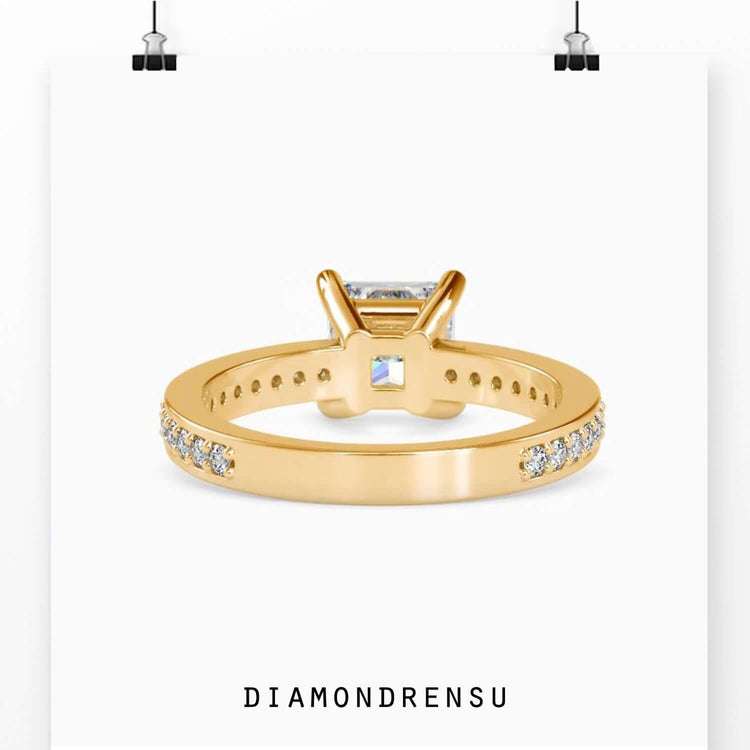 Basket setting ring with princess cut diamond in yellow gold
