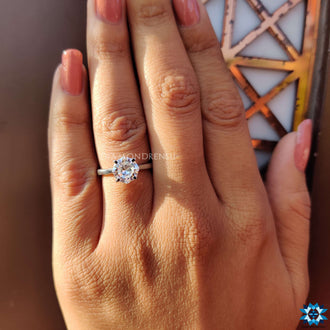 Cathedral setting solitaire ring, offering an elevated design for a timeless look.
