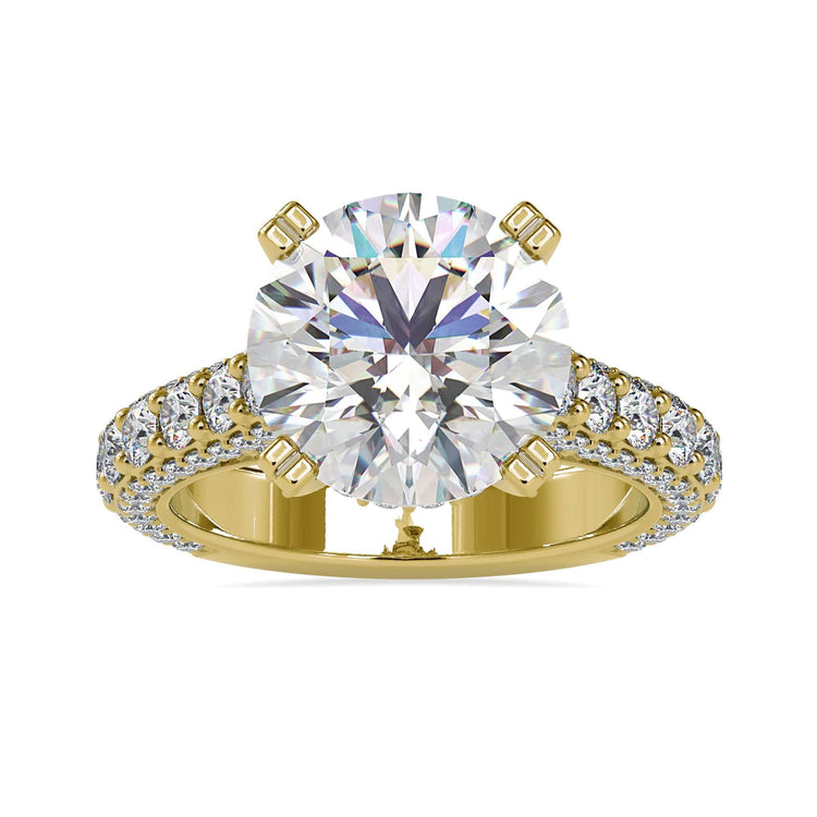 Side stone engagement ring featuring a cathedral style design.
