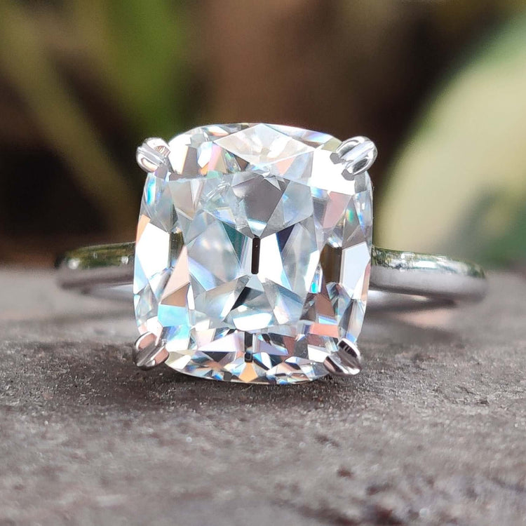 Cushion cut moissanite ring with stunning brilliance.