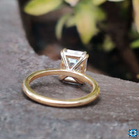 Moissanite emerald cut ring for a chic and sophisticated engagement look.
