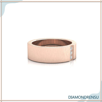 Three stone engagement ring and wedding band, rose gold setting.
