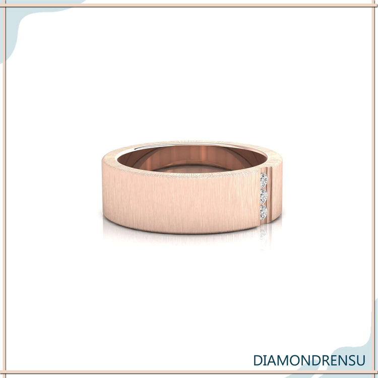 Three stone engagement ring and wedding band, rose gold setting.
