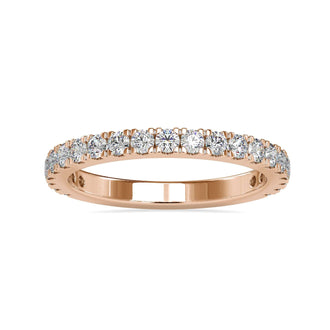 Gold pave band with prong tabs setting and round brilliant cut diamonds.
