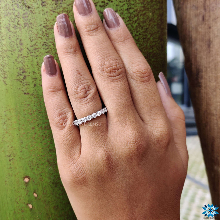 Stunning round eternity band featuring exquisite craftsmanship.