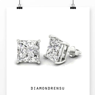 White gold diamond earrings with princess cut diamonds, designed for a sleek, modern look.
