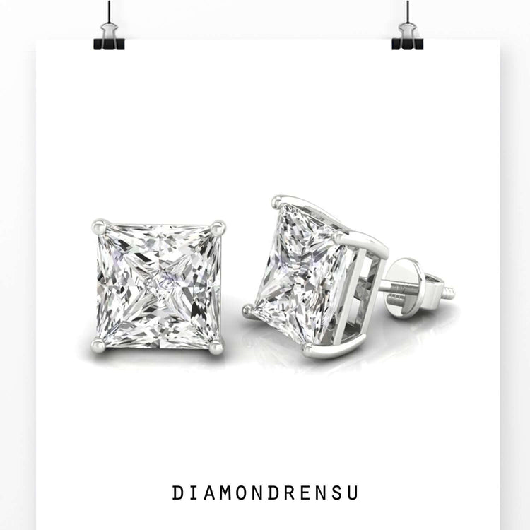 White gold diamond earrings with princess cut diamonds, designed for a sleek, modern look.
