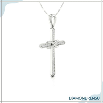 The round diamond cross pendant adds sparkle and faith to your look.
