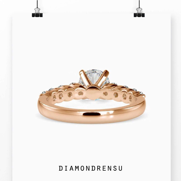 Handcrafted diamondrensu engagement ring with a round diamond, pave setting, and igi certified diamond.