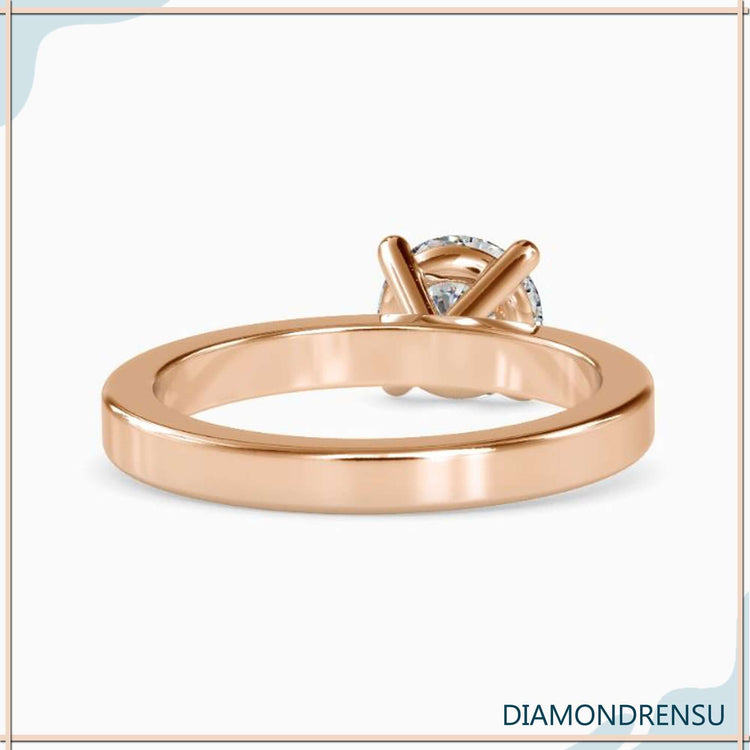 Exquisite simple solitaire ring with a secure basket setting for everyday wear.