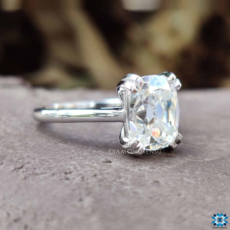 Moissanite engagement ring with a cushion cut design for a modern bride.
