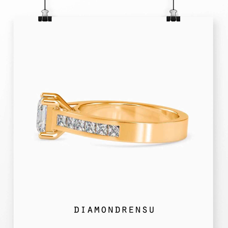 Handmade jewelry with a channel setting, featuring a princess cut diamond
