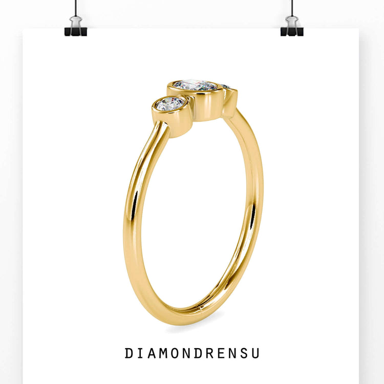 Engagement ring with side stones and a 2 ct oval diamond centerpiece
