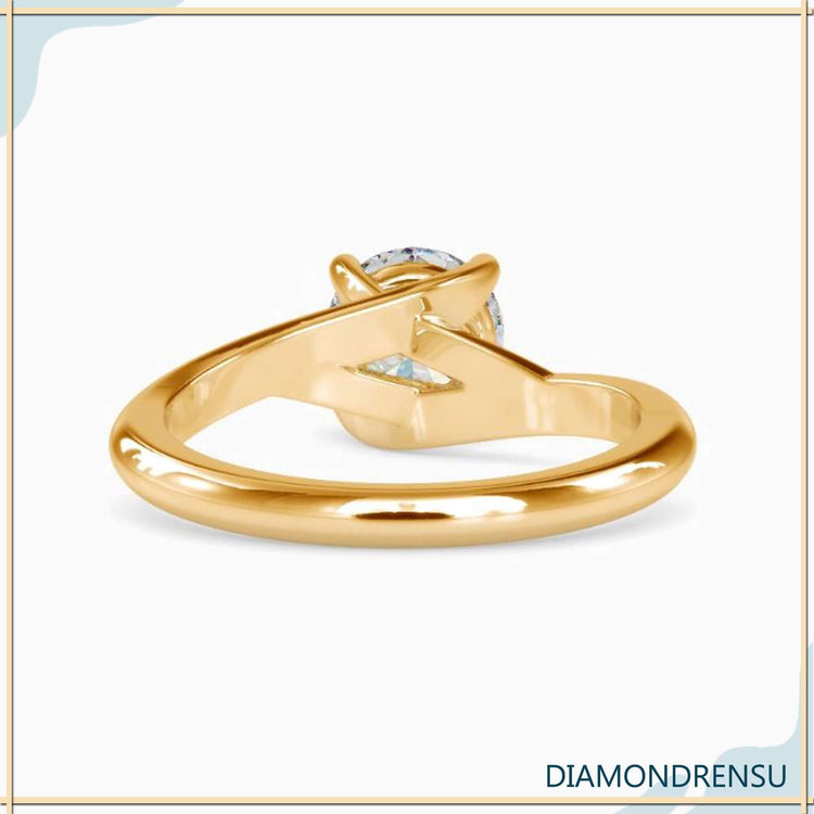 Beautiful engagement ring basket setting featuring a round solitaire cut diamond.