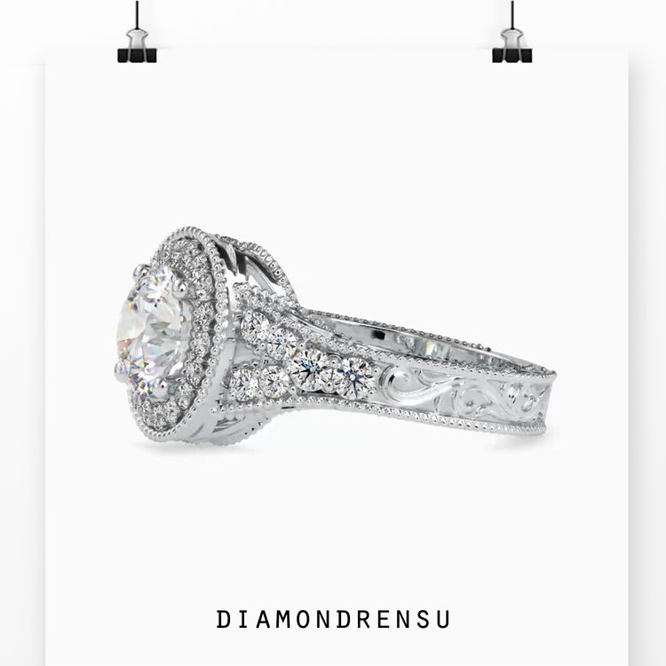 Halo diamond engagement ring featuring a stunning split shank design.
