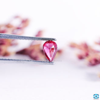 Loose gemstone natural ruby gemstone pear cut.
