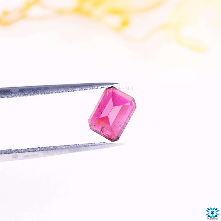 October birthstone tourmaline with emerald cut.
