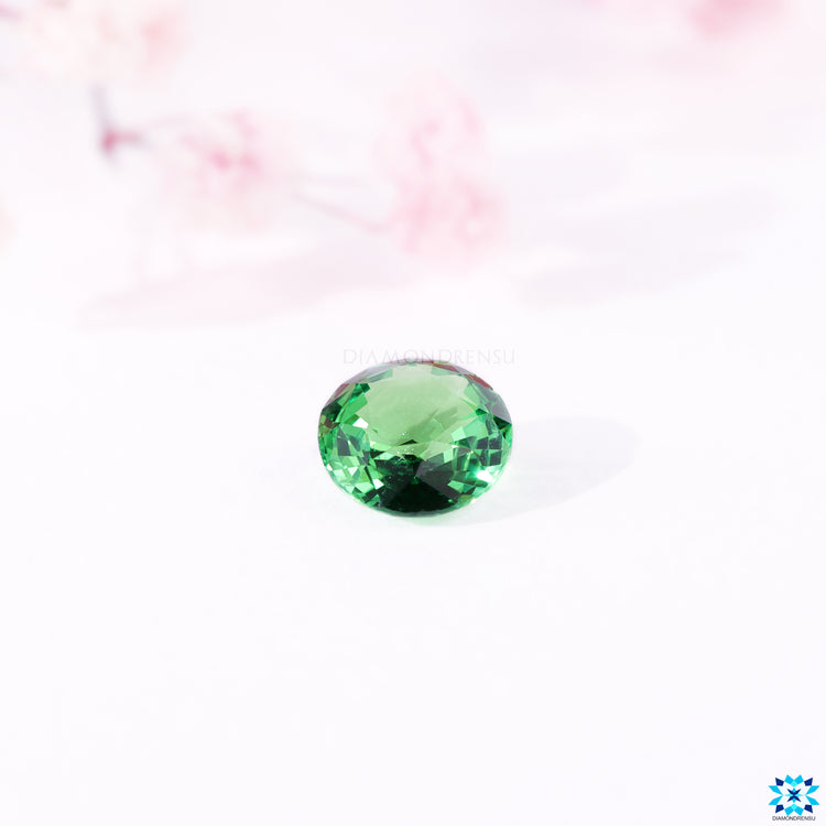 Green gemstone presented as tsavorite gemstone.
