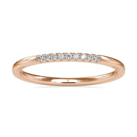 Round diamond gold band with minimalist design in yellow gold.
